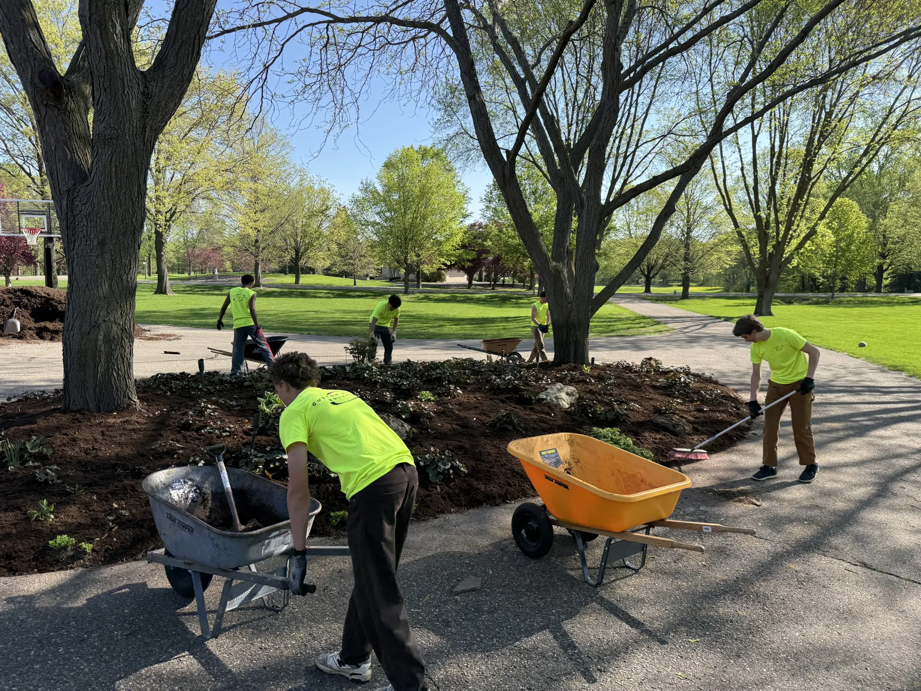 Crew working on landscape bed