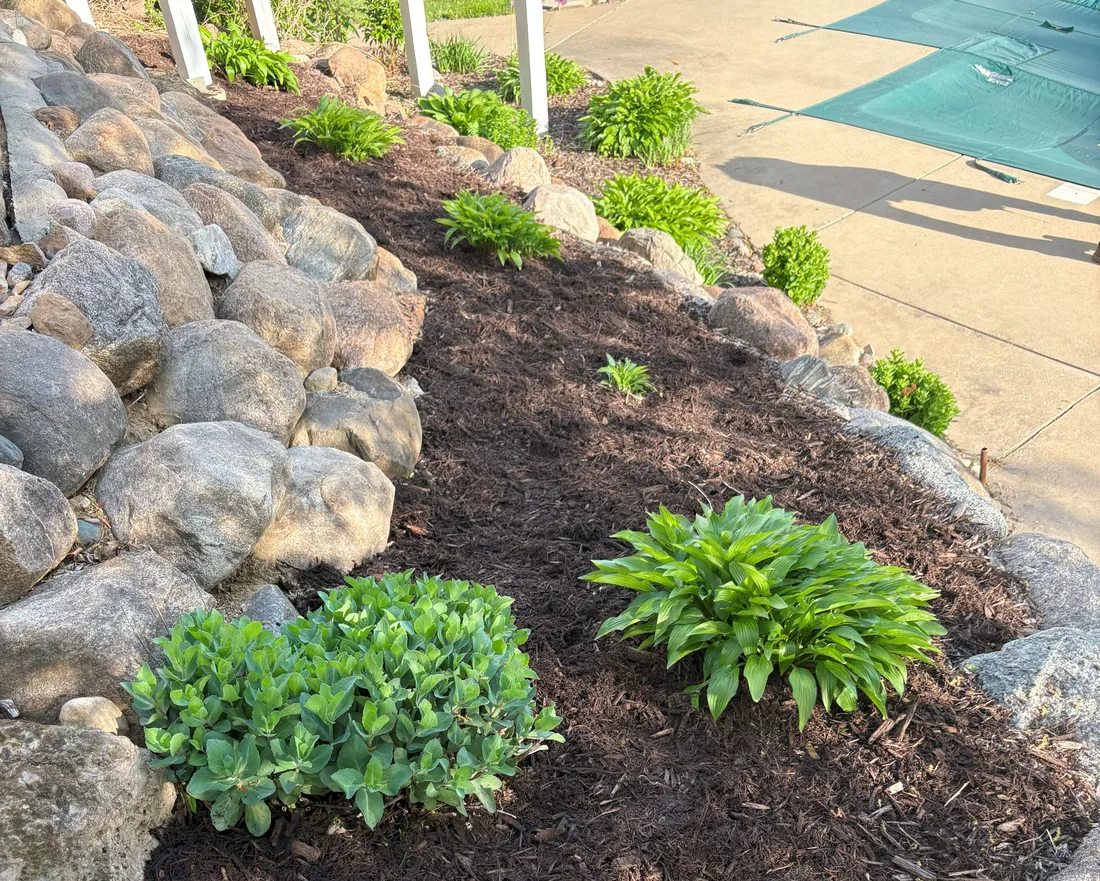 Rock install around boulders